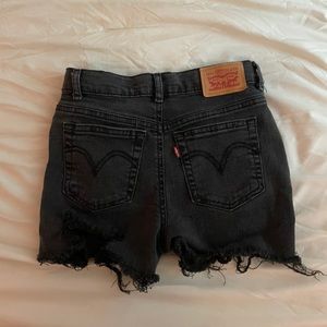 Black distressed Levi’s high rise shorts